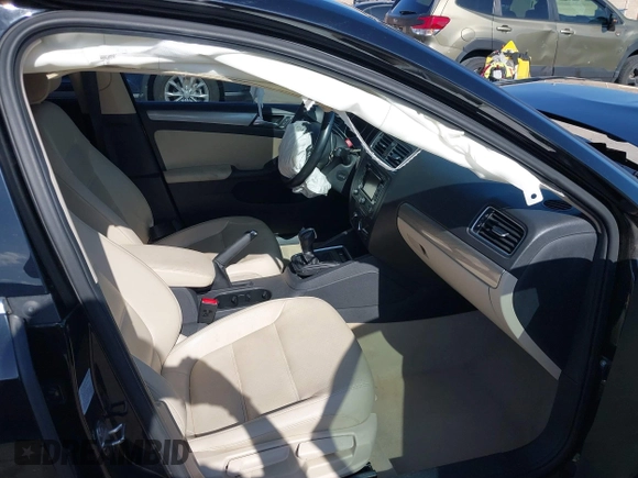 2015 Volkswagen Jetta Sedan 1.8T SE w/Connectivity with VIN 3VWD07AJ6FM354397, listed as a IAAI auction lot 41772983 with 100,265 mi miles. Bid and sale history available at carsss.com. Image 5.