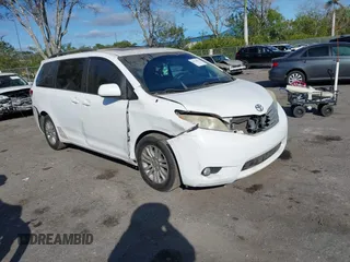 2012 Toyota Sienna XLE AAS with VIN 5TDYK3DC0CS254294, listed as a IAAI auction lot 41274822 with 135,135 mi miles and . Bid and sale history available at carsss.com. Image 1.