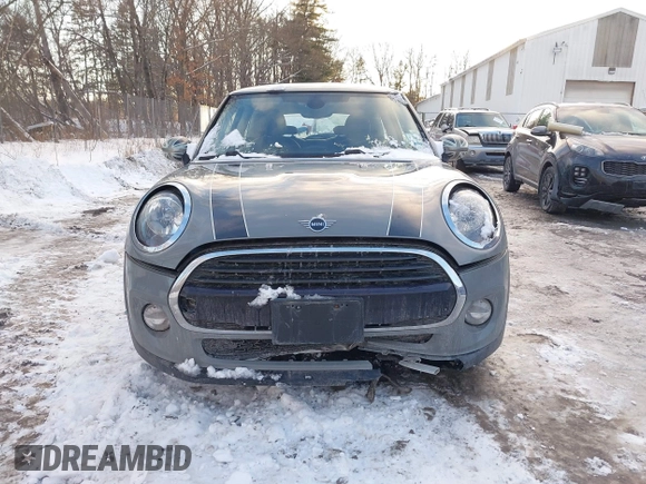 2019 MINI Hardtop Cooper with VIN WMWXP5C52K2H91038, listed as a IAAI auction lot 41509304 with 77,123 mi miles and . Bid and sale history available at DreamBid. Image 6.