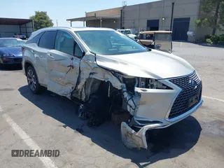 2020 Lexus RX 450hL with VIN JTJHGKFA1L2009192, listed as a IAAI auction lot 42593535 with 54,366 mi miles and . Bid and sale history available at DreamBid. Image 1.