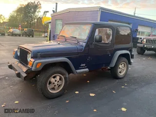 2003 Jeep Wrangler SE with VIN 1J4FA29143P371506, listed as a Copart auction lot 80153184 with 101,513 mi miles and Clean Title. Bid and sale history available at carsss.com. Image 2.