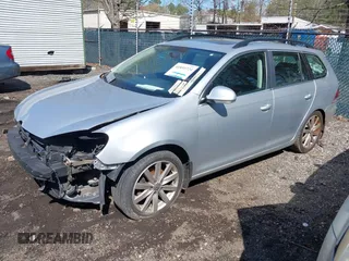 2013 Volkswagen Jetta SportWagen S with VIN 3VWPP7AJ2DM693289, listed as a IAAI auction lot 41859724 with 124,096 mi miles. Bid and sale history available at carsss.com. Image 2.