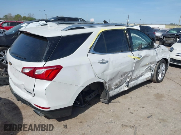 2018 Chevrolet Equinox Premier with VIN 2GNAXWEX3J6141427, listed as a IAAI auction lot 41830179 with 76,707 mi miles and . Bid and sale history available at carsss.com. Image 4.