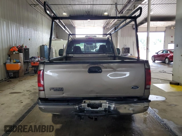 2004 Ford F-250 XL with VIN 1FTNF21L74EA64859, listed as a Copart auction lot 60397875 with 268,149 mi miles and Salvage title. Bid and sale history available at DreamBid. Image 6.