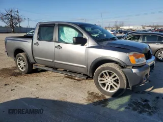 2015 Nissan Titan SV with VIN 1N6AA0EC5FN501124, listed as a Copart auction lot 87291164 with 195,448 mi miles and Salvage title. Bid and sale history available at DreamBid. Image 4.