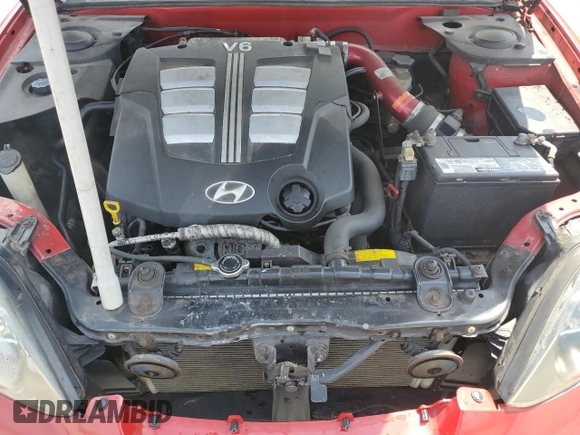 2003 Hyundai Tiburon GT z VIN KMHHN65F33U088538, wystawiony jako Copart lot #54320955 z przebiegiem 220 732 mil mil oraz Szkoda całkowita • Salvage title. Historia ofert i sprzedaży dostępna na DreamBid. Obrazek 11.