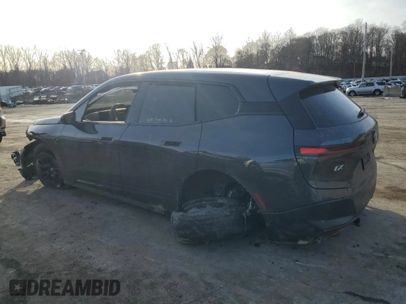 2024 BMW iX xDrive50 z VIN WB523CF02RCP06595, wystawiony jako Copart lot #44179575 z przebiegiem Nie podano mil oraz Szkoda całkowita • Salvage title. Historia ofert i sprzedaży dostępna na DreamBid. Obrazek 2.