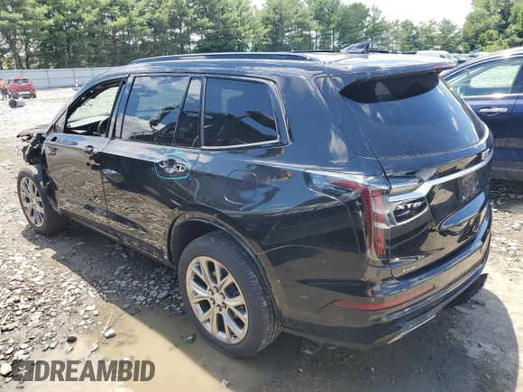 2020 Cadillac XT6 AWD Sport with VIN 1GYKPGRS2LZ121673, listed as a Copart auction lot 60315414 with 34,430 mi miles and Salvage title. Bid and sale history available at DreamBid. Image 2.