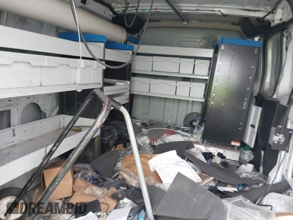 2016 Ford Transit Cargo z VIN 1FTYR1ZM5GKA09697, wystawiony jako IAAI lot #41929098 z przebiegiem 98 790 mil mil oraz . Historia ofert i sprzedaży dostępna na DreamBid. Obrazek 8.