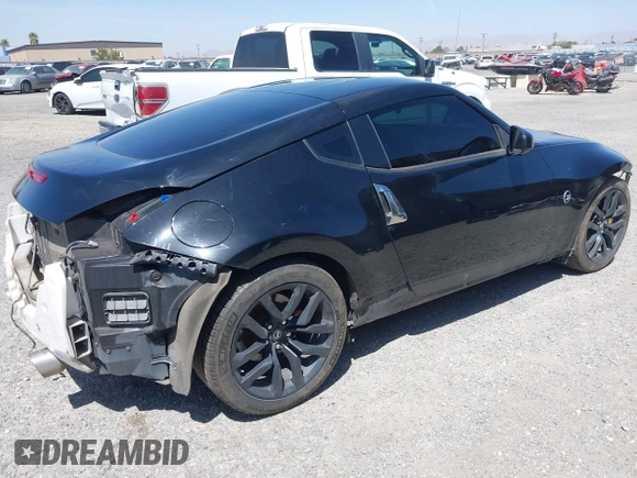 2019 Nissan 370Z Sport Touring with VIN JN1AZ4EH1KM420719, listed as a IAAI auction lot 42096816 with 97,803 mi miles and . Bid and sale history available at DreamBid. Image 4.