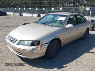 2001 Toyota Camry CE with VIN JT2BG22K910581703, listed as a IAAI auction lot 42020085 with 107,035 mi miles. Bid and sale history available at carsss.com. Image 2.