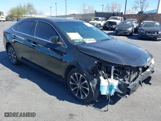 2016 Toyota Avalon Limited with VIN 4T1BK1EB9GU235952, listed as a IAAI auction lot 41042267 with 125,932 mi miles. Bid and sale history available at carsss.com. Image 1.