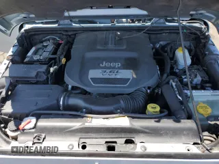 2012 Jeep Wrangler Arctic z VIN 1C4AJWBGXCL156600, wystawiony jako Copart lot #56369065 z przebiegiem 216 808 mil mil oraz Szkoda całkowita • Salvage title. Historia ofert i sprzedaży dostępna na DreamBid. Obrazek 11.