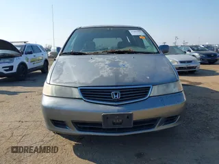 2000 Honda Odyssey EX z VIN 2HKRL187XYH619354, wystawiony jako IAAI lot #41461901 z przebiegiem Nie podano mil oraz . Historia ofert i sprzedaży dostępna na DreamBid. Obrazek 6.