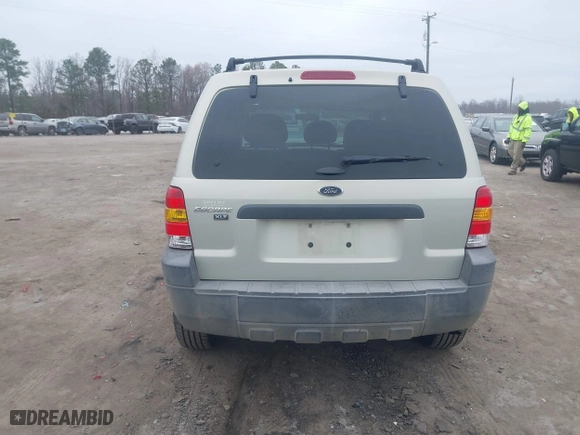 2005 Ford Escape XLT with VIN 1FMYU93135DA07844, listed as a IAAI auction lot 41786019 with 118,840 mi miles. Bid and sale history available at carsss.com. Image 16.