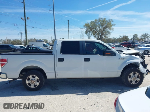 2012 Ford F-150 XL with VIN 1FTEW1CM2CFC06897, listed as a IAAI auction lot 41641309 with 123,853 mi miles. Bid and sale history available at carsss.com. Image 13.