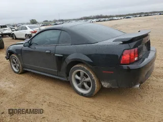 2002 Ford Mustang GT Deluxe with VIN 1FAFP42X42F214888, listed as a Copart auction lot 44379755 with 77,207 mi miles and Salvage Title. Bid and sale history available at carsss.com. Image 2.