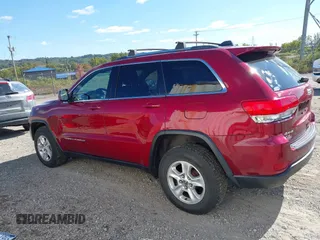 2014 Jeep Grand Cherokee Laredo with VIN 1C4RJFAG8EC262292, listed as a IAAI auction lot 40568162 with 124,871 mi miles and . Bid and sale history available at DreamBid. Image 15.