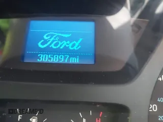 2015 Ford Transit Cargo with VIN 1FTNE1YGXFKA66907, listed as a IAAI auction lot 41605119 with 305,897 mi miles and . Bid and sale history available at DreamBid. Image 15.