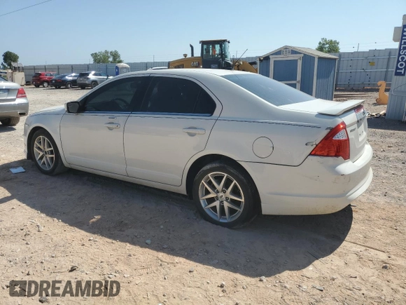 2012 Ford Fusion SEL z VIN 3FAHP0JA3CR336743, wystawiony jako Copart lot #45455065 z przebiegiem 126 456 mil mil oraz Szkody całkowita. Historia ofert i sprzedaży dostępna na DreamBid. Obrazek 2.