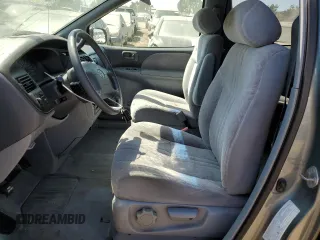 2000 Toyota Sienna LE with VIN 4T3ZF13C6YU296375, listed as a Copart auction lot 63846875 with 279,915 mi miles and Salvage title. Bid and sale history available at DreamBid. Image 7.