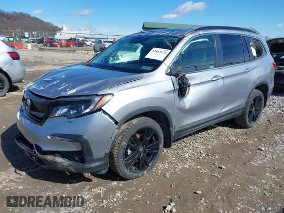 2021 Honda Pilot Special Edition with VIN 5FNYF6H20MB066095, listed as a IAAI auction lot 41863123 with 65,930 mi miles. Bid and sale history available at carsss.com. Image 2.