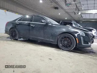 2019 Cadillac CTS Luxury AWD with VIN 1G6AX5SS9K0144003, listed as a Copart auction lot 84439534 with 112,485 mi miles and Salvage title. Bid and sale history available at DreamBid. Image 4.