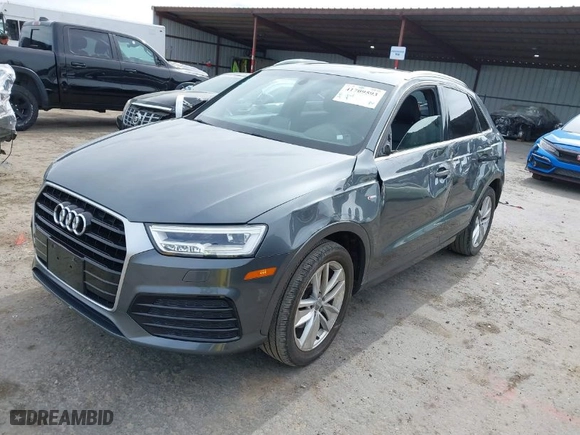 2018 Audi Q3 Premium Plus with VIN WA1HCCFS7JR019415, listed as a IAAI auction lot 41709593 with 59,445 mi miles. Bid and sale history available at carsss.com. Image 2.