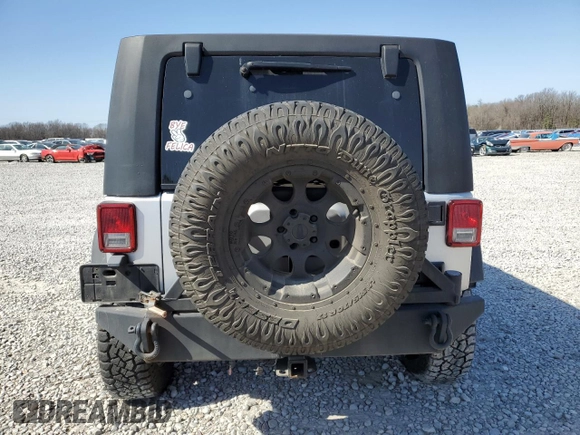 2010 Jeep Wrangler Unlimited Rubicon with VIN 1J4BA6H12AL107485, listed as a Copart auction lot 48802825 with 123,299 mi miles and Salvage title. Bid and sale history available at DreamBid. Image 6.