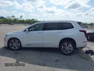 2023 Cadillac XT6 FWD Premium Luxury with VIN 1GYKPCRS3PZ186210, listed as a IAAI auction lot 42290027 with 44,117 mi miles and . Bid and sale history available at DreamBid. Image 14.