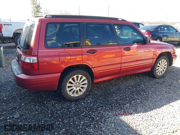 2002 Subaru Forester S w/Premium Pkg with VIN JF1SF656X2H757330, listed as a IAAI auction lot 41758034 with 228,297 mi miles. Bid and sale history available at carsss.com. Image 4.