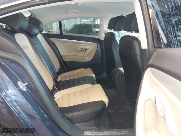 2013 Volkswagen CC Sport with VIN WVWBN7ANXDE515691, listed as a IAAI auction lot 41598295 with 104,461 mi miles. Bid and sale history available at carsss.com. Image 8.