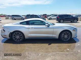 2018 Ford Mustang EcoBoost with VIN 1FA6P8THXJ5128830, listed as a IAAI auction lot 42192673 with 58,817 mi miles and . Bid and sale history available at DreamBid. Image 14.