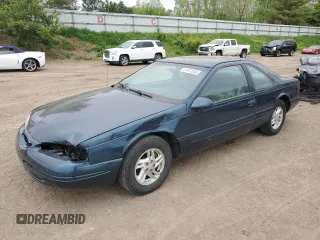 1996 Ford Thunderbird LX z VIN 1FALP62W6TH108356, wystawiony jako Copart lot #57417955 z przebiegiem 34 802 mil mil oraz Szkoda całkowita • Salvage title. Historia ofert i sprzedaży dostępna na DreamBid. Obrazek 1.