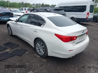 2015 Infiniti Q50 Premium with VIN JN1BV7AR1FM405143, listed as a IAAI auction lot 42267204 with 120,886 mi miles and . Bid and sale history available at DreamBid. Image 3.