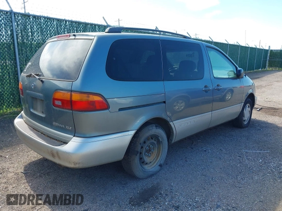 2000 Toyota Sienna LE with VIN 4T3ZF13C6YU173739, listed as a IAAI auction lot 42162320 with 173,659 mi miles. Bid and sale history available at carsss.com. Image 4.