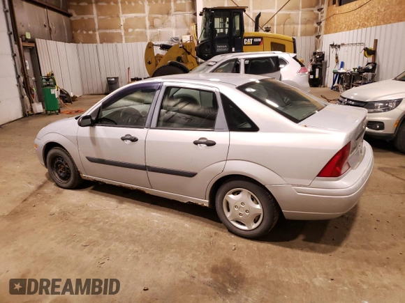 2002 Ford Focus LX with VIN 1FAFP33P92W148086, listed as a Copart auction lot 72825424 with 235,066 mi miles and Clean Title. Bid and sale history available at DreamBid. Image 2.