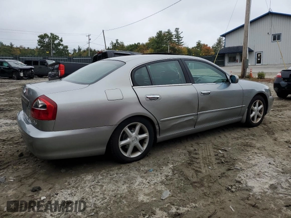 2002 Infiniti Q45 z VIN JNKBF01A52M002920, wystawiony jako Copart lot #73249364 z przebiegiem 95 955 mil mil oraz Tytuł czysty. Historia ofert i sprzedaży dostępna na DreamBid. Obrazek 3.