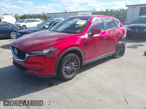 2020 Mazda CX-5 Sport with VIN JM3KFABM7L1819493, listed as a IAAI auction lot 41304240 with 52,940 mi miles. Bid and sale history available at carsss.com. Image 17.