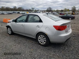2010 Kia Forte EX z VIN KNAFU4A28A5109118, wystawiony jako Copart lot #56460755 z przebiegiem 143 845 mil mil oraz Szkoda całkowita • Salvage title. Historia ofert i sprzedaży dostępna na DreamBid. Obrazek 2.