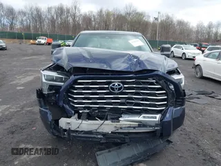 2022 Toyota Tundra Capstone Hybrid with VIN 5TFVC5DB5NX009829, listed as a IAAI auction lot 41983391 with 70,015 mi miles and . Bid and sale history available at DreamBid. Image 12.
