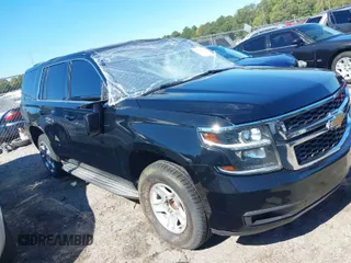 2015 Chevrolet Tahoe Commercial z VIN 1GNLC2EC3FR280365, wystawiony jako IAAI lot #40580594 z przebiegiem 195 740 mil mil oraz . Historia ofert i sprzedaży dostępna na DreamBid. Obrazek 1.