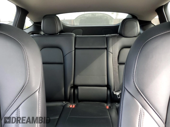 2021 Tesla Model Y Long Range with VIN 5YJYGDEEXMF217816, listed as a Copart auction lot 51008665 with 57,392 mi miles and Salvage Title. Bid and sale history available at DreamBid. Image 10.