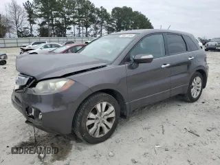 2010 Acura RDX with VIN 5J8TB2H20AA005351, listed as a Copart auction lot 86677384 with 184,663 mi miles and Salvage Title. Bid and sale history available at carsss.com. Image 1.