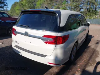 2019 Honda Odyssey EX-L with VIN 5FNRL6H74KB015835, listed as a IAAI auction lot 42044603 with 109,740 mi miles. Bid and sale history available at carsss.com. Image 4.