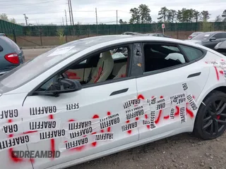 2023 Tesla Model S Plaid with VIN 5YJSA1E68PF507197, listed as a IAAI auction lot 42062258 with Not provided miles and . Bid and sale history available at DreamBid. Image 6.