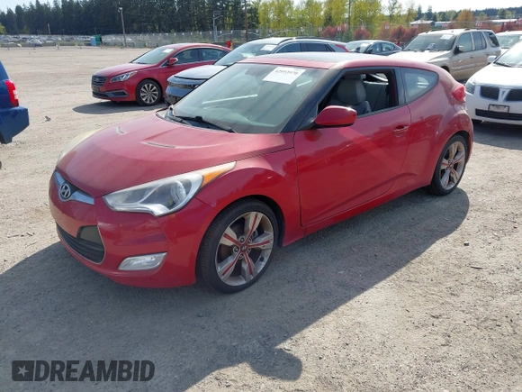 2012 Hyundai Veloster w/Black Int z VIN KMHTC6AD4CU077164, wystawiony jako IAAI lot #42053970 z przebiegiem 122 657 mil mil oraz . Historia ofert i sprzedaży dostępna na DreamBid. Obrazek 2.