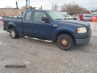 2006 Ford F-150 STX with VIN 1FTRX12W66FB10292, listed as a IAAI auction lot 41708615 with 199,214 mi miles. Bid and sale history available at carsss.com. Image 1.