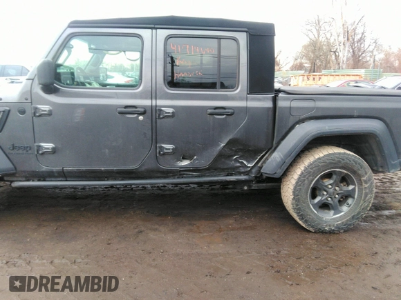 2021 Jeep Gladiator Sport S z VIN 1C6HJTAG3ML597041, wystawiony jako IAAI lot #41714640 z przebiegiem 46 402 mil mil oraz . Historia ofert i sprzedaży dostępna na DreamBid. Obrazek 14.