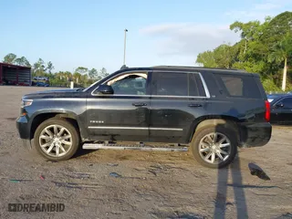 2018 Chevrolet Tahoe LT with VIN 1GNSCBKC1JR365875, listed as a IAAI auction lot 41584072 with 61,957 mi miles. Bid and sale history available at carsss.com. Image 15.